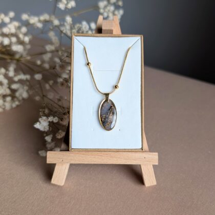 Owalna zawieszka, czarno-złoty marmur